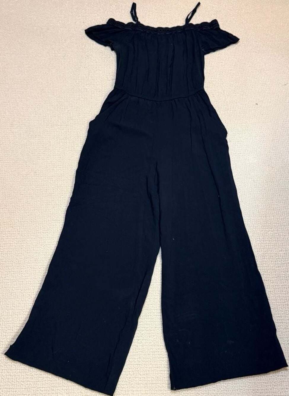 it's Black Off Shoulder Ruffle Wide Leg Jumpsuit Size M